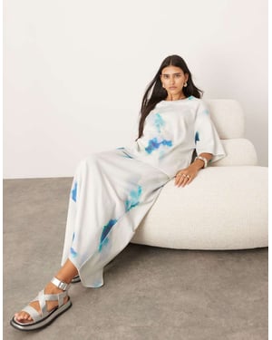 ASOS EDITION premium tungvikts texturerad jersey kolumn maxikjol i suddig tryck