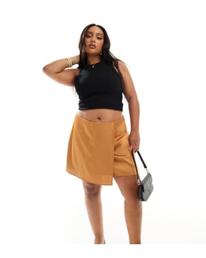 ASOS DESIGN Curve satin omlott minikjol i gyllene skymning