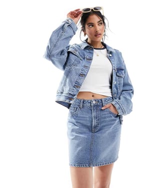 ASOS DESIGN denim högmidjad minikjol i mellanblått