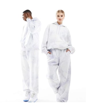 Weekday unisex co-ord joggers i drömsk blå batik exklusivt för ASOS