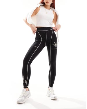 Couture Club oversized grafiska leggings med kontrastsöm i svart