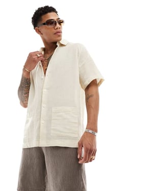 ASOS DESIGN relaxed textured shirt with patch pockets in sand