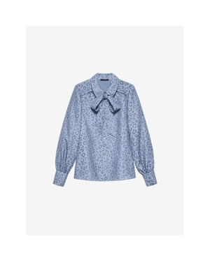 Nikkie Pragues leopard blouse dessin