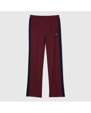 Women's Lacoste Open Hem Woven Joggers in Red