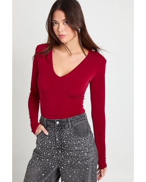 Slinky Plunge Front Long Sleeve Shoulder Pad Bodysuit