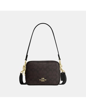 Mini Carey Crossbody Bag In Signature Canvas