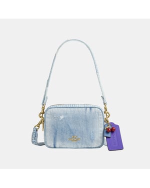 Mini Carey Crossbody Bag In Loved Denim With Charms