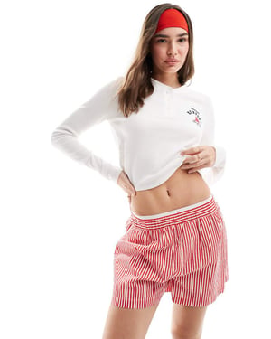 ASOS DESIGN långärmad våffeltröja med Newport yacht-ficka grafik i vitt