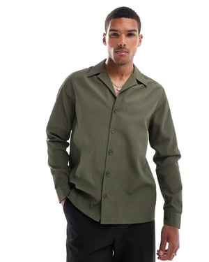 ASOS DESIGN avslappnad texturerad skjorta med omvänd krage i khaki