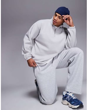 ASOS DESIGN avslappnad kvartdragkedja fleece-sweatshirt i ljusgrå - LGREY