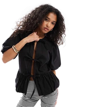 ASOS DESIGN bomullsblus med puffärmar och peplum i svart