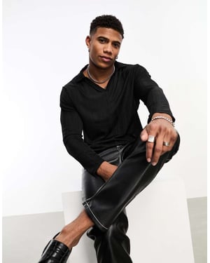 ASOS DESIGN långärmad polo i genomskinlig ribb med djup V-ringning