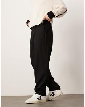 ASOS DESIGN smart oversized tapered texturerade byxor i svart