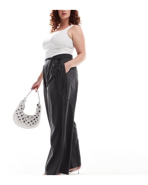 ASOS DESIGN Curve skräddarsydda vida byxor med knytdetalj i grått