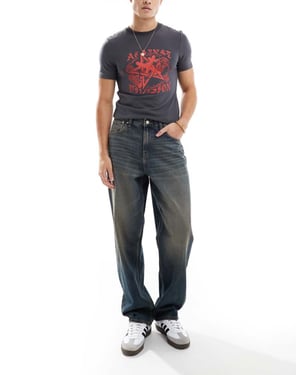 ASOS DESIGN baggy jeans med vintage-ton i medelblå tvätt