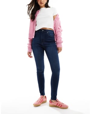ASOS DESIGN ultimate skinny jeans i mörkblå