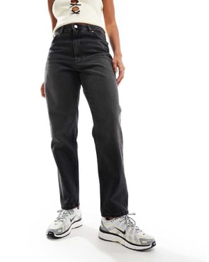 Monki Taiki hög midja ballongben jeans i tvättad svart