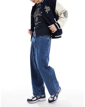 Jack & Jones Ron skaterpassform jeans i medelblå tvätt