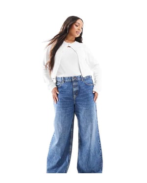 ASOS DESIGN Curve vida byxor i mörk mellanblå