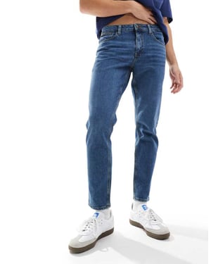 ASOS DESIGN stretch tapered jeans i mörk tvätt blå