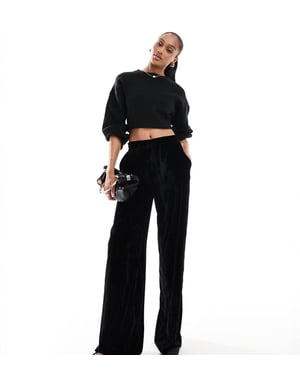ASOS DESIGN Höga krinklad sammet dragsko byxor i svart