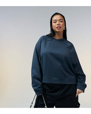 ASOS DESIGN Curve oversized sweat with raglan detail in charcoal