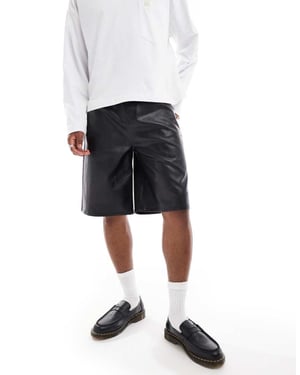 ASOS DESIGN long length faux leather shorts in black