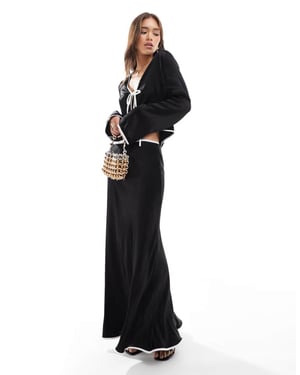 ASOS DESIGN satin bias contrast maxi skirt in black