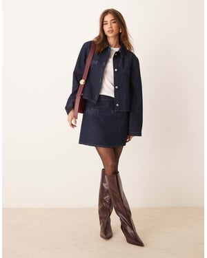 ASOS DESIGN denim tailored mini skirt with seam details in indigo