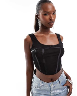 ASOS DESIGN sleeveless mesh corset top in black