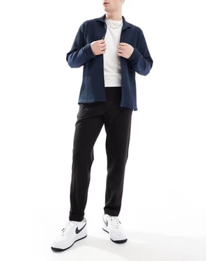 ASOS DESIGN smart tapered fit chino trousers in black with half elasticated waist