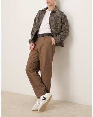 ASOS DESIGN smart oversized tapered cotton chino trousers with front pleat in khaki