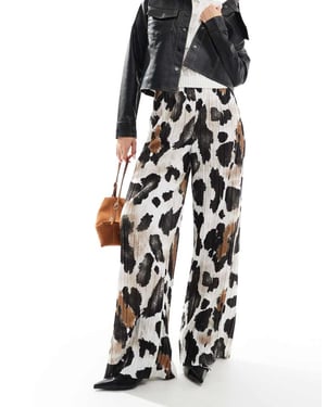 Vero Moda plisse wide leg trousers in abstract cow print