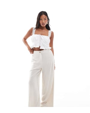 ASOS DESIGN Petite tailored wide leg dad trousers with linen in stone