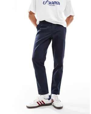 ASOS DESIGN tapered trousers in navy