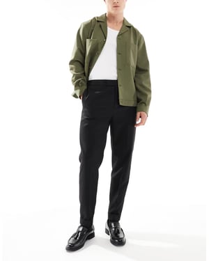 ASOS DESIG smart tapered fit trousers with in black twill with half elasticated waist