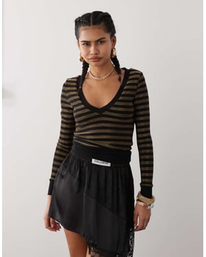 Motel Annora long sleeve knit top in gold stripe