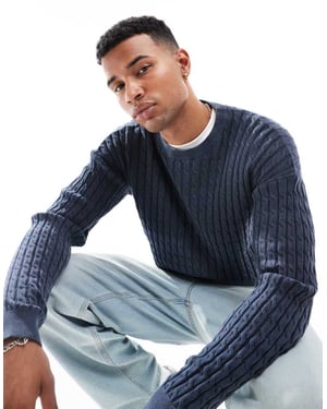 ASOS DESIGN relaxed washed knitted cable knit jumper in navy