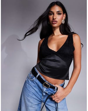 ASOS DESIGN lace bust top in black stretch satin