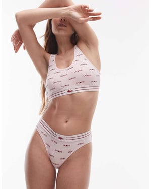Lacoste bralette in light pink with all over valentines logo print