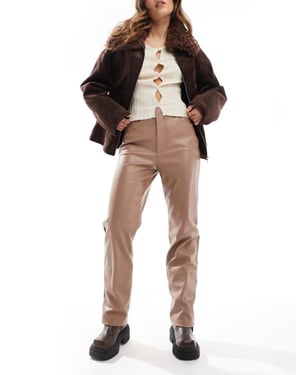 ASOS DESIGN faux leather straight leg trousers in mocha