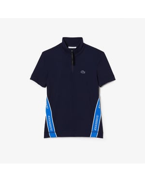 Women's Lacoste Ribbed Collar Zip Neck Short Sleeve Polo Shirt in Navy Blue