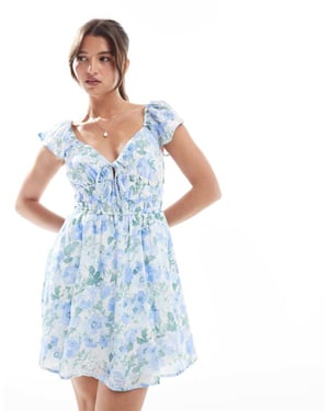 Hollister short sleeve shirred waist detail mini skater dress in floral print