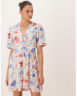 Nobody's Child Starlight short sleeve mini dress in shell tile print
