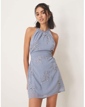 ASOS DESIGN miniklänning med halterneck och broderi i blommor, öppens baksida i dämpad blå