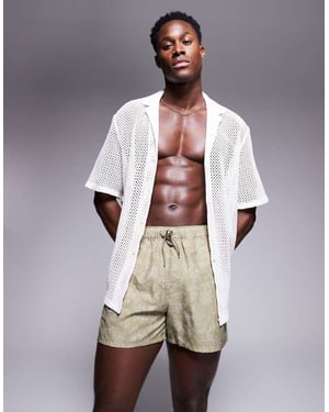 ASOS DESIGN badshorts i kort längd med blommönster i grön