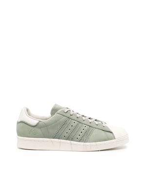 Superstar sneakers met losse draden