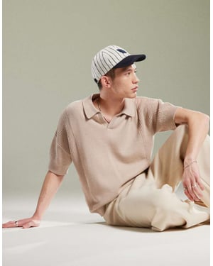 ASOS DESIGN relaxed knitted notch neck polo in stone