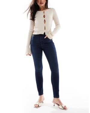 ASOS DESIGN ultimate skinny jeans i mörk mellanblå