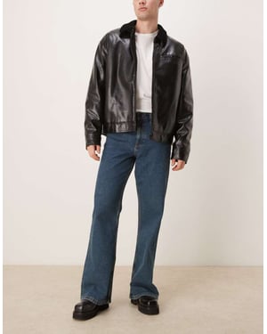 ASOS DESIGN vida utställda jeans i mörk tvätt blå